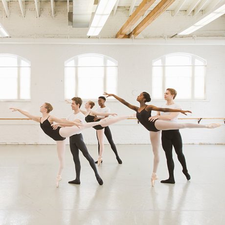 Academy students posing in leotards