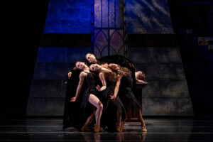 Members of BalletMet's Dracula cast on stage in 2022