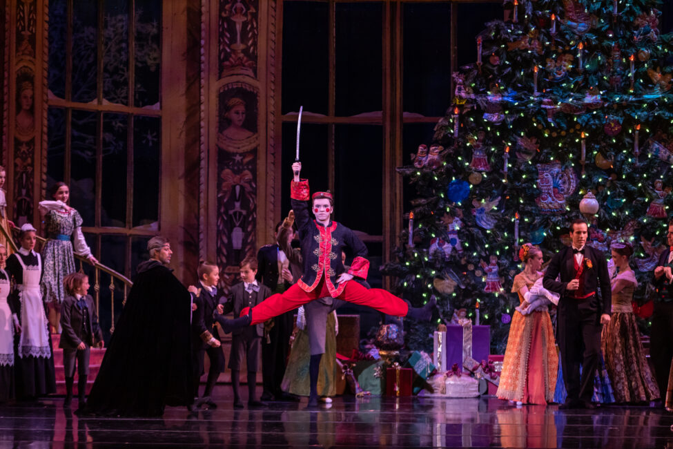 BalletMet dancer leaping in the role of Chinese in The Nutcracker.