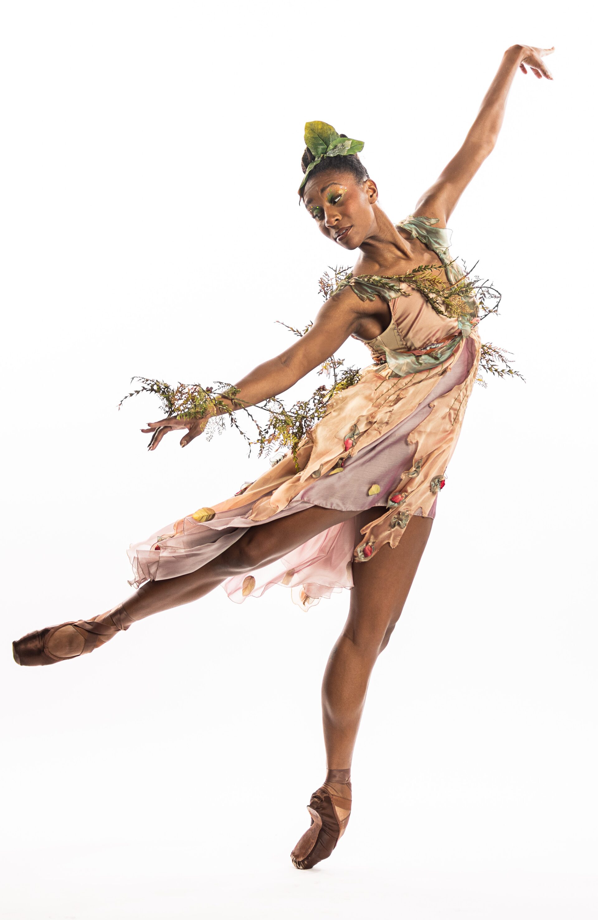 BalletMet dancer poses gracefully while portraying Tinkerbell.